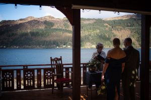 water 3 people looking out to the water