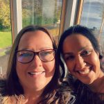 Selfie of 2 woman one with glasses