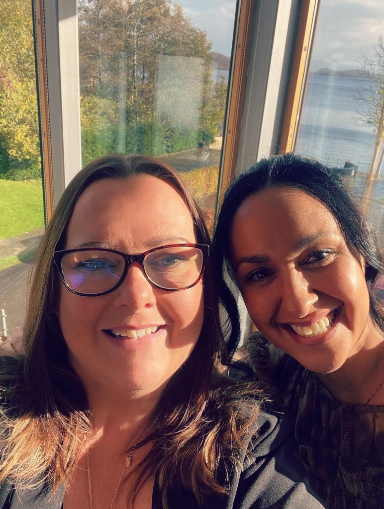 Selfie of 2 woman one with glasses