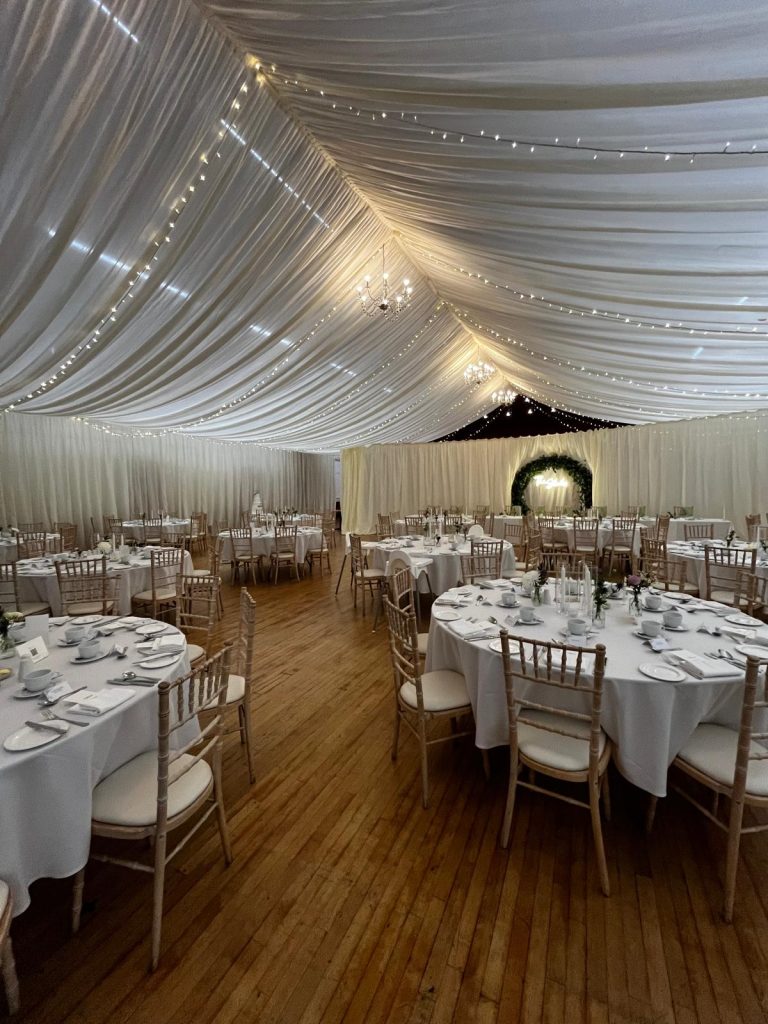 image showing tables set out for a wedding party