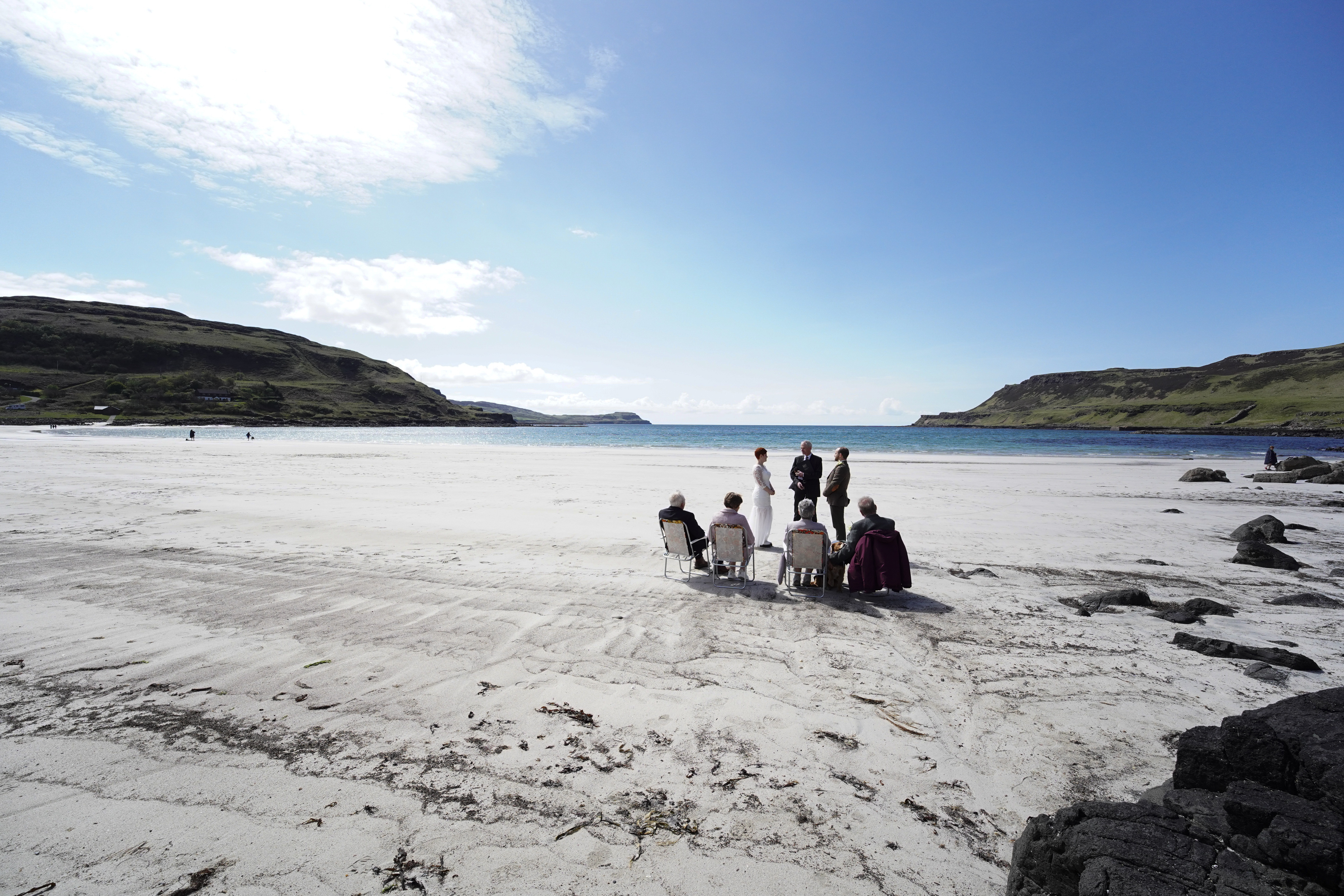 a group of people on a beach