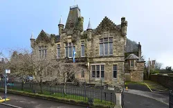 image of the outside of a large historic building