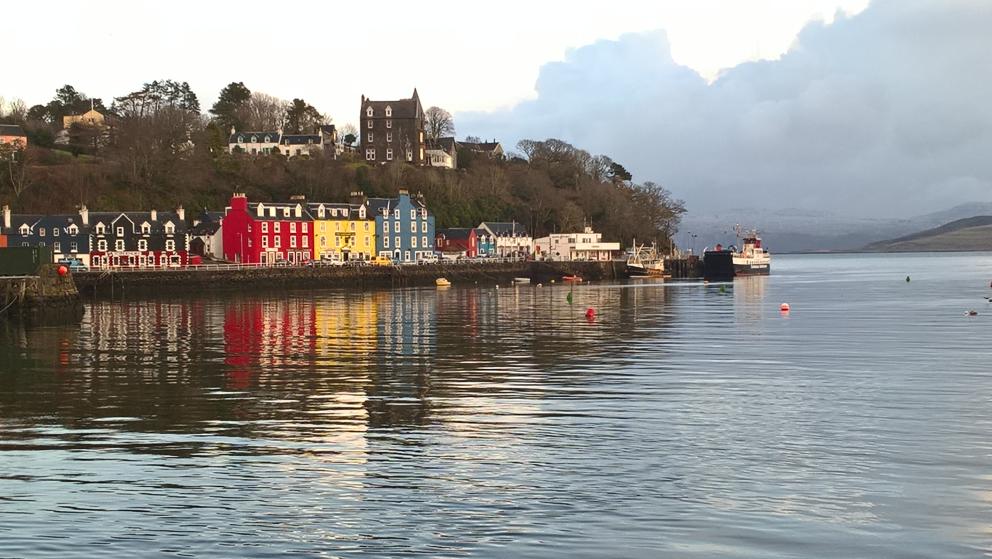 Images shows mulit coloured houses at Tobermory, Mull