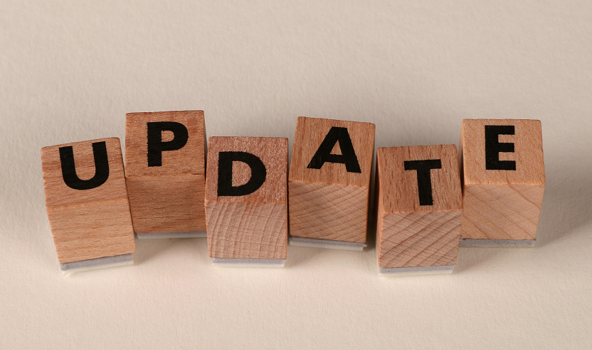 wooden blocks spelling out the word update