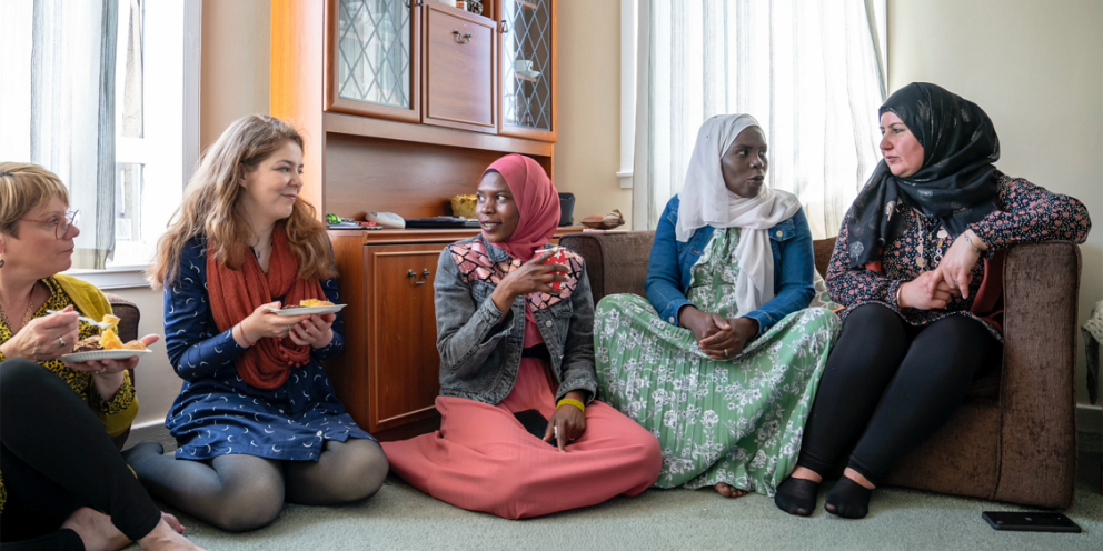 group of women sitting chatting