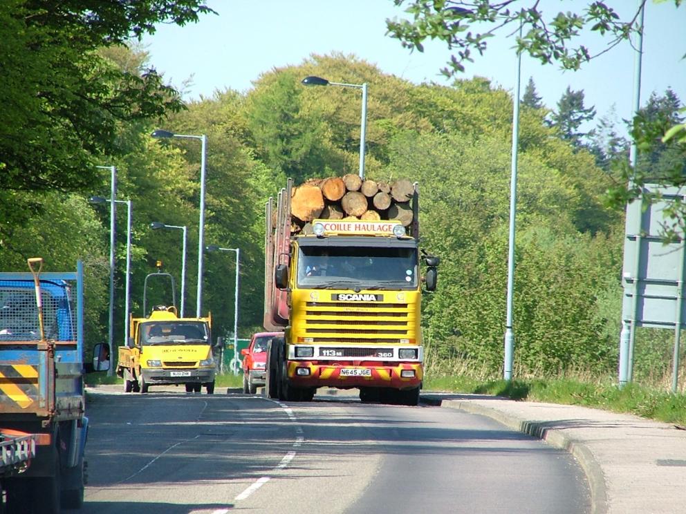 Timber lorry on a main road