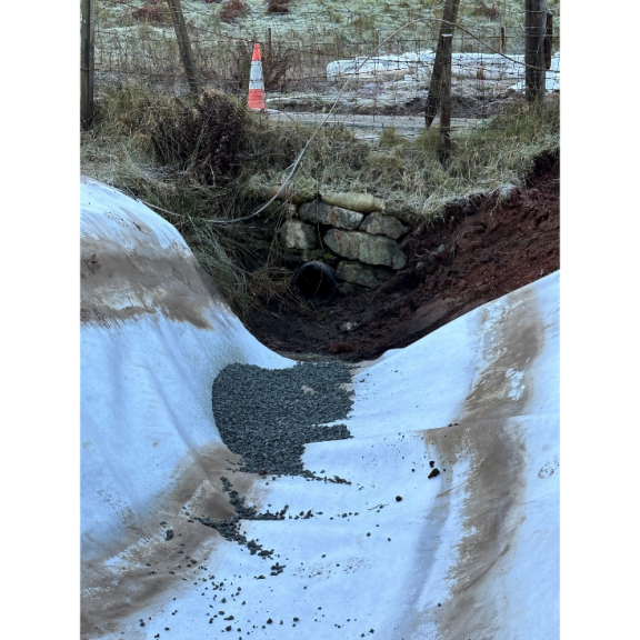 A816 landslip at Ardfern - 27th November - laying the geotextile grid