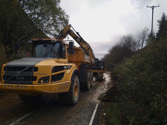Roads team using machinery to work on clearing the road after the Ardfern landslip