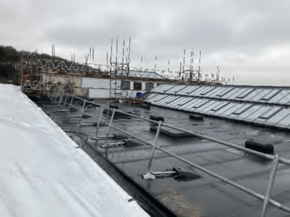 Main Roof new vapour barrier and insulation laid with insulation board mechanically fixed to sub-strate.