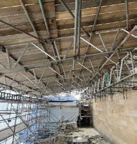 Roof 4a (overlooking Argyle St.) Temporary roof scaffold insitu.  Existing membrane on roof 4a being removed.