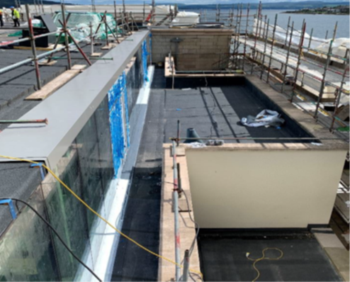Rothesay Pavilion - Roof Area 2e, 4 & 5b Overview of completed works.  Roof 5 parapet (south facing elevation) new capping insitu – work in progress.