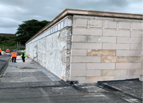 Rothesay Pavilion - Roof 5 & 3b (viewed west): chase cut into stonework on east facing (front) elevation to accommodate waterproofing membrane upstand. 