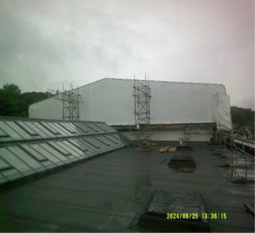 Temporary scaffold and over roof insitu.