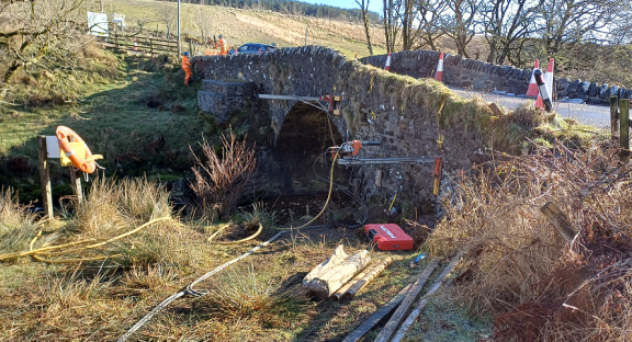 Workers at Claonaig bridge