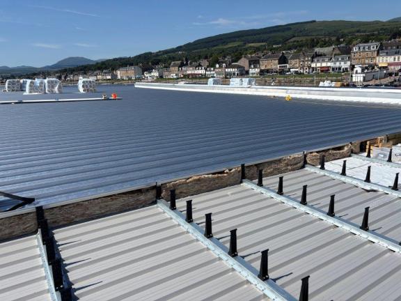Image shows repairs progressing on the roof 