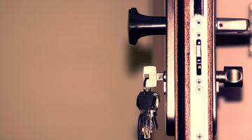 side view of door with keys hanging from lock