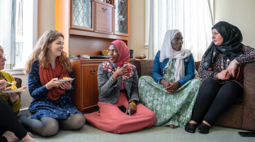 group of women sitting chatting
