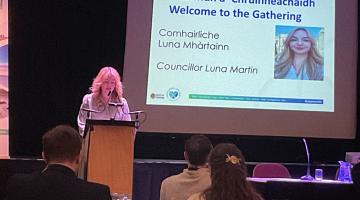 Image shows Councillor Luna Martin speaking at the Gaelic Gathering event