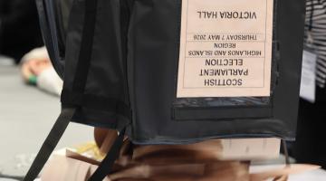 ballot box being emptied