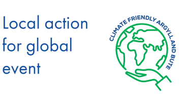 Globe with hand and text