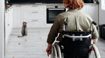 lady in wheelchair in kitchen
