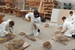 Pupils trying their hand at brickwork 