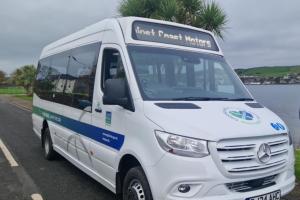 White bus with Argyll and Bute Council branding
