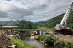 concrete beams are in place on reinforced concrete abutments