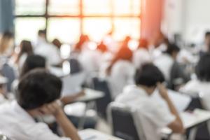 Image shows students sitting their exams