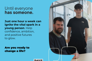 Image shows a young male learner with his mentor