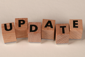 wooden blocks spelling out the word update