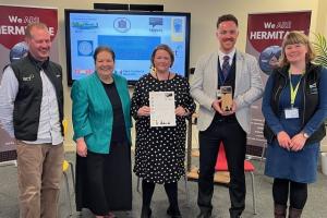 1.	Cardross Primary School teaching staff receiving Carbon Literate Educator Award (L-R: Jamie Joyce (ACT), Jackie Baillie MSP, Kelly Girling (Cardross Primary), Nick Henry (Cardross Primary), Lindsey Young (ACT)