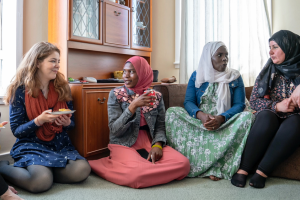 group of women sitting chatting