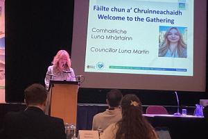 Image shows Councillor Luna Martin speaking at the Gaelic Gathering event