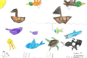 Image shows a ship sailing on the sea with lots of sea creatures below the water