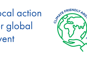 Globe with hand and text