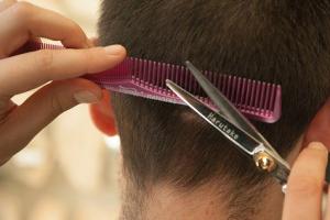 close up of man having a hair cut