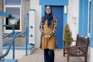A piucture of Bute resident Rasha Rasho outside her place of work on the island