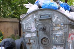 overflowing rubbish bin