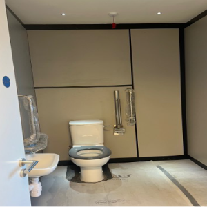 Ground Floor Disabled WC including boiler housing behind full height access door.