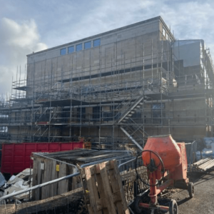 Erection of scaffold and temporary roof